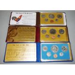 Three Singapore proof coin sets