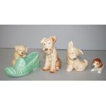 Four various Sylvac dog figures