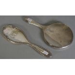 Two various sterling silver backed hand mirrors