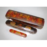 Three antique Persian paper mache pencil boxes