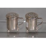 Pair of Swedish silver tankard form pepperettes