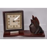 Vintage Bakelite desk clock with dog figure