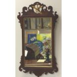 George III mahogany fretted mirror