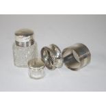 Two sterling silver & cut glass toiletry bottles