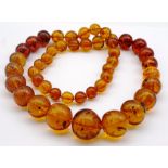 Baltic amber graduated bead matinee necklace.