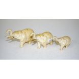 Three graduated antique carved ivory elephants