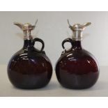 Near pair antique glass wine flasks