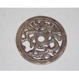 Round metal Chinese amulet