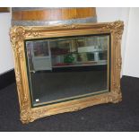 Gilt framed wall mirror