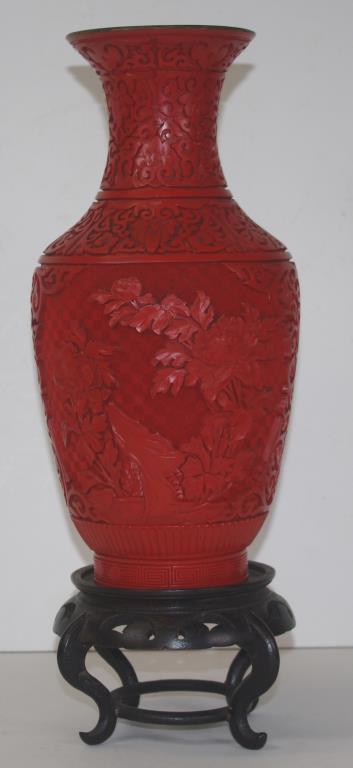 Large Chinese cinnabar vase on a timber stand