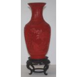 Large Chinese cinnabar vase on a timber stand