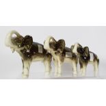 Three graduated Royal Dux elephant figurines