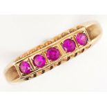 14ct gold and pink sapphire ring