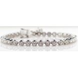 3.695ct Diamond and 18ct gold tennis bracelet