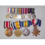 Four WW1 medals and accompany miniature medals