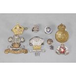 Collection of military badges & uniform attire