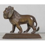 Small bronze lion figurine