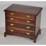 George III style miniature chest of drawers,