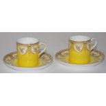 Two Royal Worcester demi tasse cups & saucers