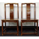 Pair of Chinese hardwood yoke back chairs