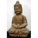 Carved stone seated Buddha figure