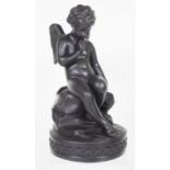 Black basalt seated cupid figure
