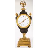 Late 18th C: French urn clock.