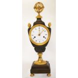 French gilt and patinated bronze mantle clock