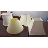 Four electric lamp shades