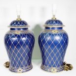 Pair of blue bulbous pottery table lamps