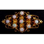 Opal and 14ct yellow gold pendant brooch