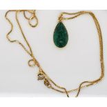 Malachite and gold pendant on chain