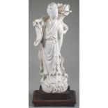 Chinese blanc de chine figure of lady with lotus