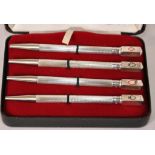 Four sterling silver propelling pencils