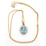 9ct gold, diamond and topaz pendant and chain