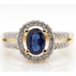 Sapphire, diamond and 14ct gold halo ring