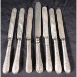 Seven various Continental & English silver knives
