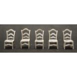 Five sterling silver miniature chairs