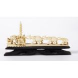 Oriental carved ivory elephant scene