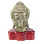 Oriental bronzed Buddha head