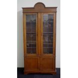 Early 20th century inlaid oak bookcase