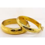 Two vintage gilt bangles