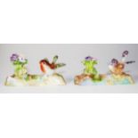 Two Crown Staffordshie bird on branch figurines