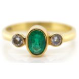 18ct gold emerald, and diamond ring