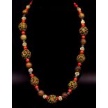Necklace of agate, coral, bone
