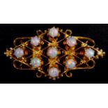Opal and 14ct yellow gold pendant brooch