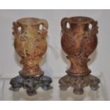 Two oriental carved soapstone vases