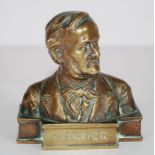 Signed brass "Wagner" paperweight