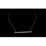 Diamond and gold bar pendant and chain