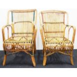 Pair vintage cane arm chairs
